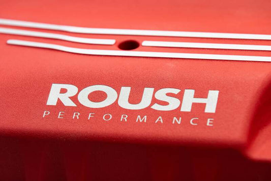 Roush 2026 Ford Mustang 5.0L supercharger kit with high-performance components and branding, designed for enhanced engine power.