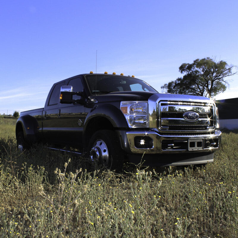 Baja Designs 11-16 Ford Super Duty S8 Series 30-inch LED light bar kit mounted on truck grille, featuring bright white LEDs.