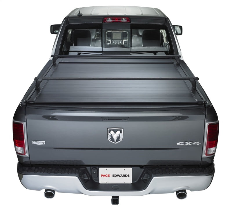 Pace Edwards UltraGroove electric retractable bed cover on a 2007-2017 Toyota Tundra CrewMax with 5ft 5in bed, shown installed on truck bed.