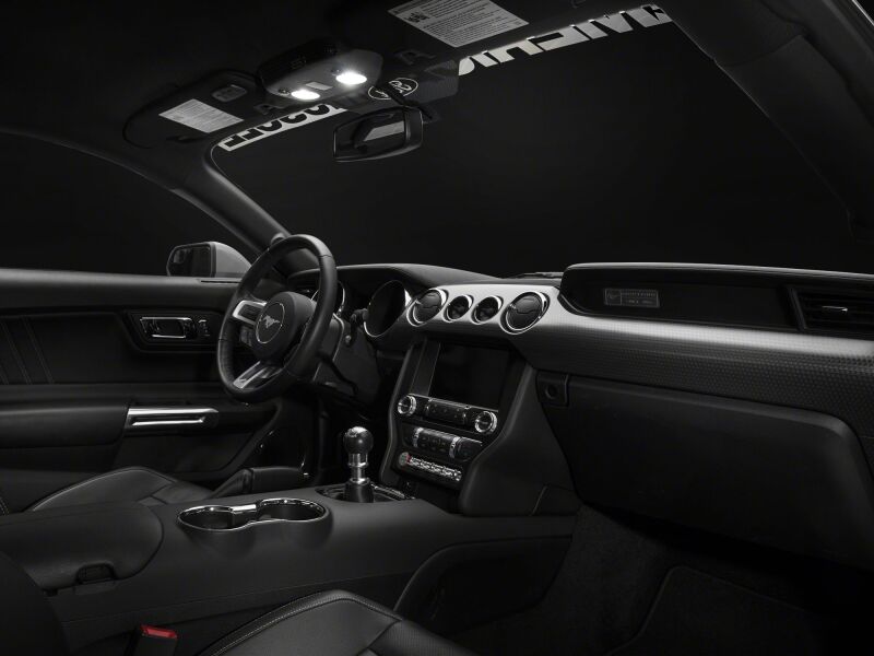 Raxiom Ford Mustang Stage 2 LED map light conversion kit installed in the interior, showcasing bright white LED light bars.
