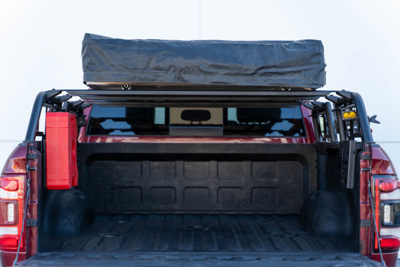 DV8 Offroad MTO Series 2-piece adjustable truck bed rack for Toyota Tundra and Ford F150 Raptor, exterior offroad accessory.