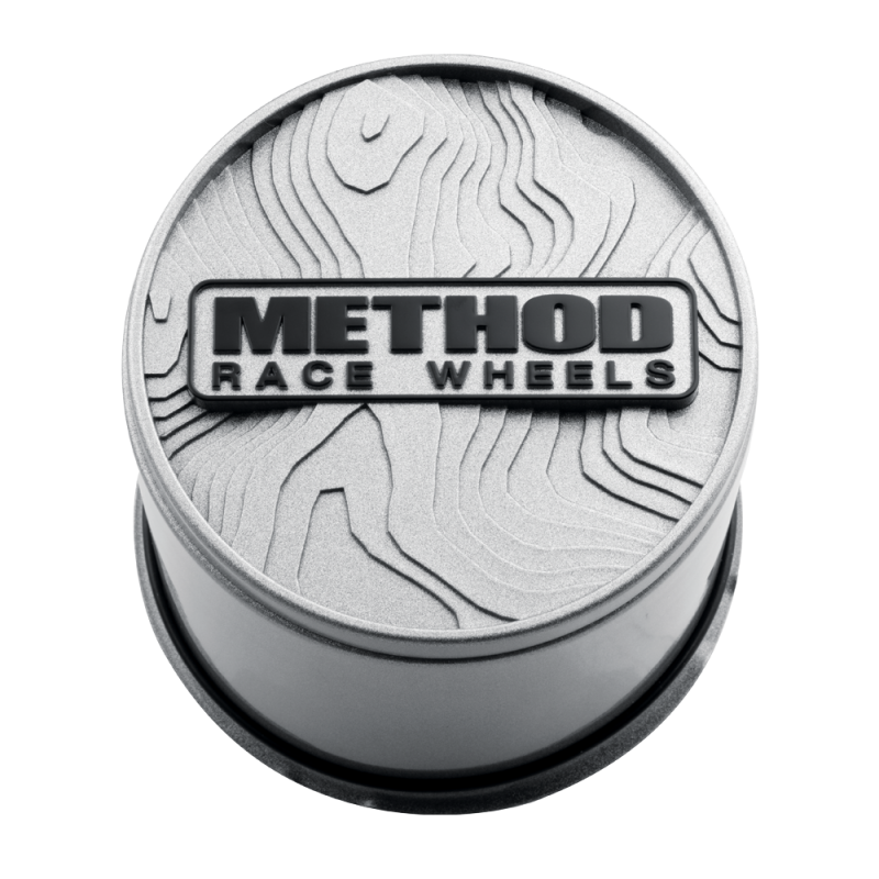Silver Method Race Wheels Topo Push-Through Center Cap for wheel centers, showcasing a sleek and durable design.