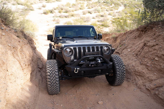 DV8 Offroad Jeep Gladiator JT cowl light bar bracket mounted on vehicle, providing a secure mount for offroad light bars.