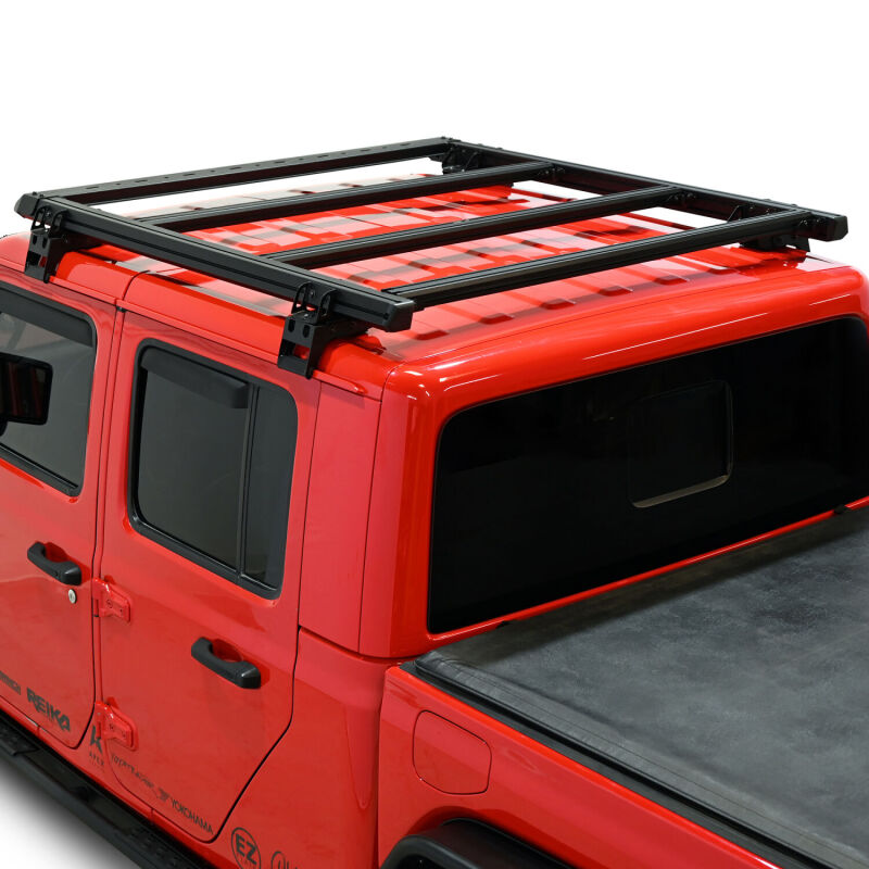 Westin Jeep Gladiator Mesa roof rack in black, mounted on the vehicle's roof for added cargo space and outdoor gear transport.