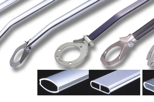 Cusco ST front strut bar for Nissan B11, B12, RZ1 models, enhancing vehicle stability with durable metal construction.