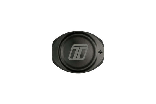 Turbosmart 10um 10AN fuel filter canister in black, showing the compact metal filter with inlet and outlet fittings.