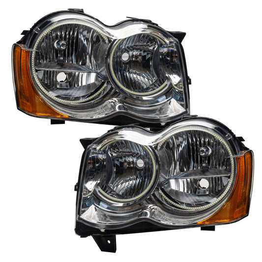 Oracle Lighting Jeep Grand Cherokee SMD Headlights with ColorSHIFT and simple controller, non-HID design, showing illuminated headlights.