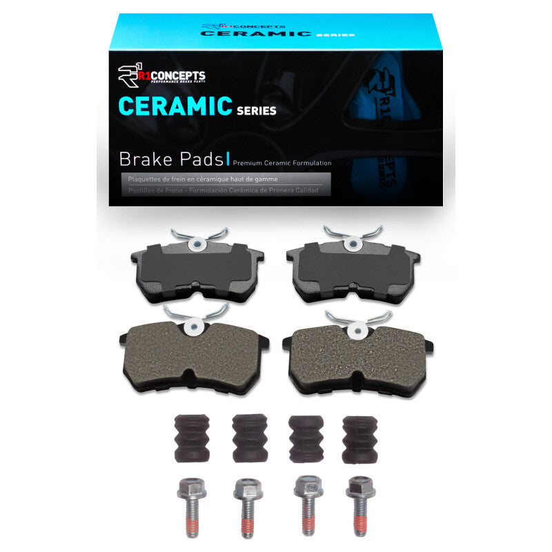 R1 Concepts Ford Focus rear ceramic brake pads and hardware kit, OE quality, showing brake pads and mounting hardware.