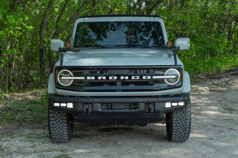 Diode Dynamics yellow fog lights for Ford Bronco Stage Series Fog Pocket Kit, mounted on vehicle with sleek design