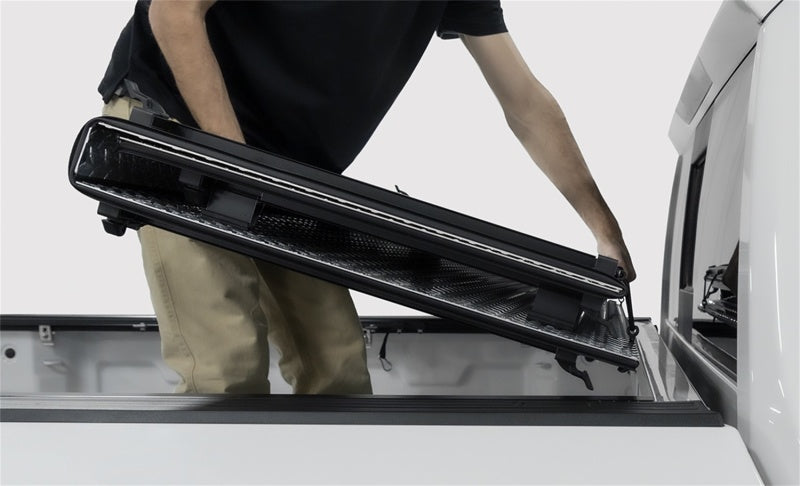 Access LOMAX Tri-Fold Truck Bed Cover for 2020+ Chevy/GMC 2500/3500 standard 6ft 8in bed in matte black exterior accessory.