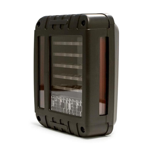DV8 Offroad Jeep Wrangler JK octagon LED tail light showing red and clear lens with mounting brackets
