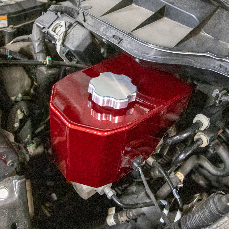 Wehrli bronze chrome brake master cylinder cover for Cummins 5.9L/6.7L engine, with detailed design and reflective finish.