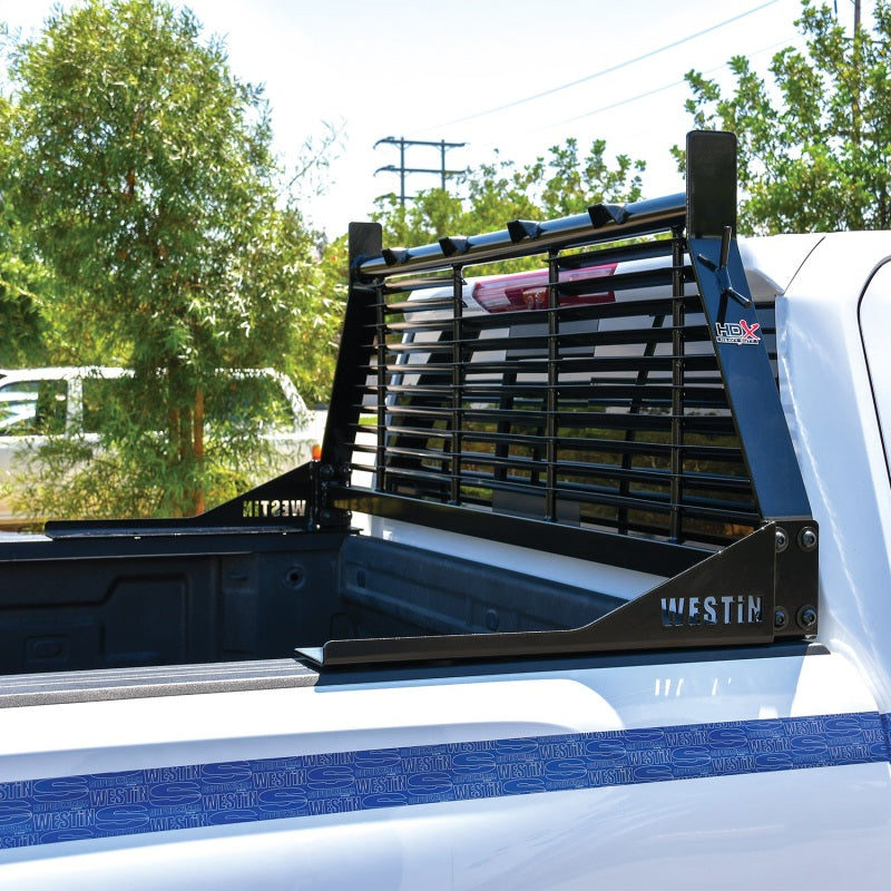 Black Westin headache rack installed on a Chevrolet, Ford, GMC, or Toyota Silverado/Sierra 1500-3500 HD truck, with mounting hardware visible.