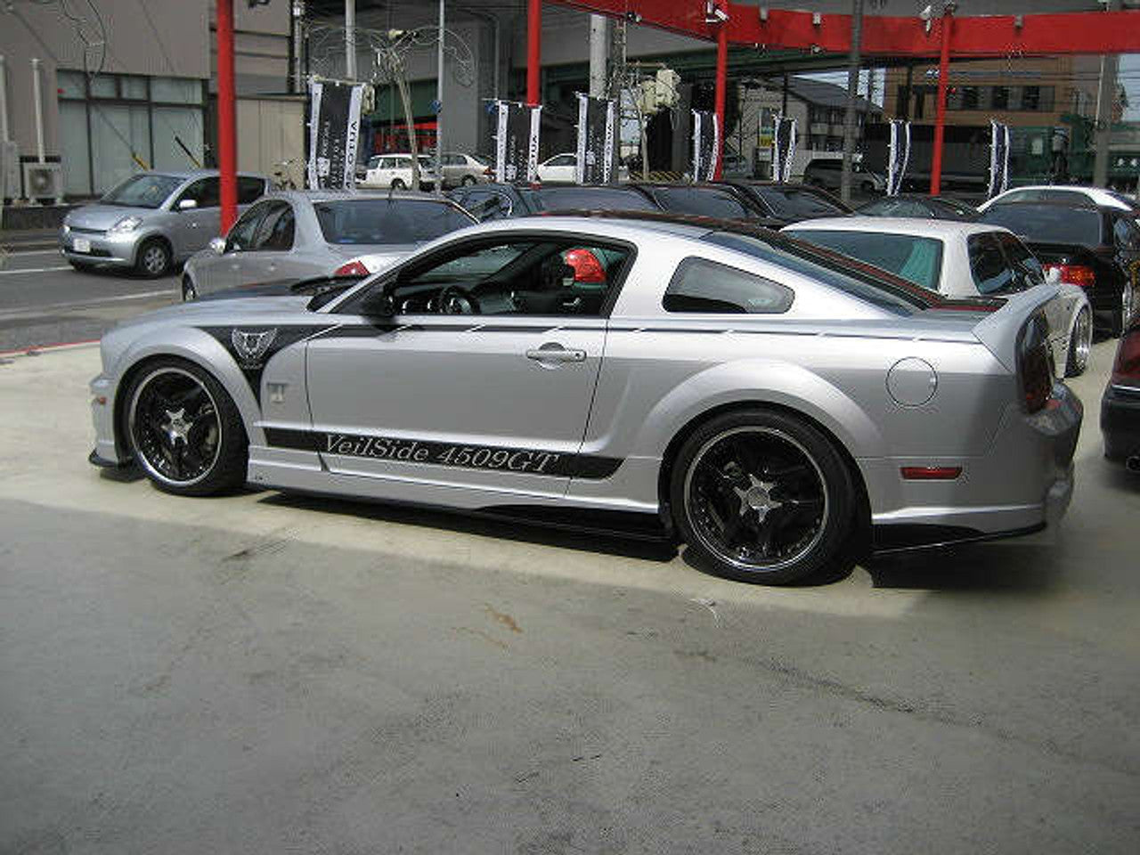 VeilSide 2005-2009 Ford Mustang GT USA Model Complete Kit (FRP) Front Bumper, Side Skirts, Door Panels, Rear Bumper & FRP Hood