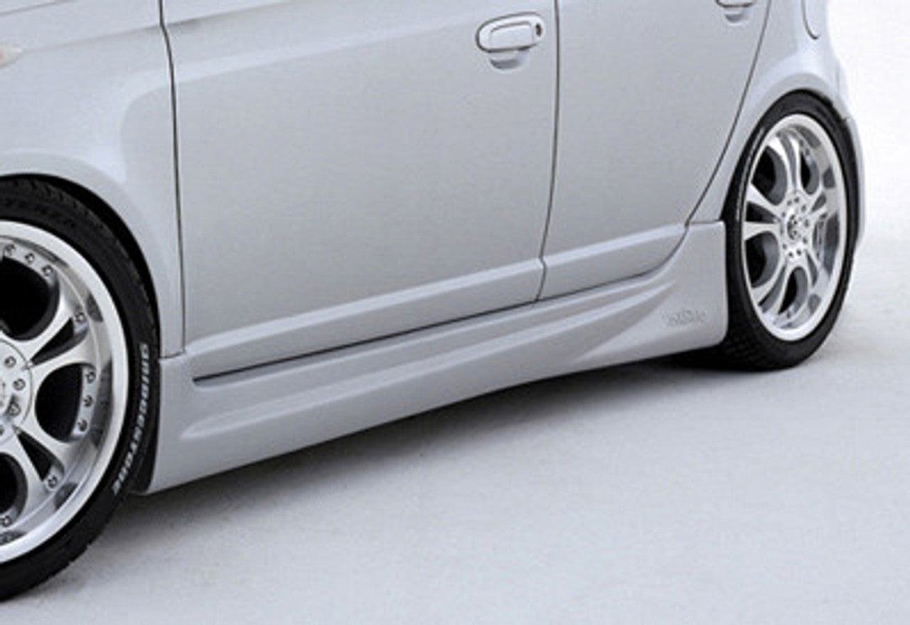 VeilSide 1998-2005 Toyota Vitz JDM SCP10/NCP10 C-Class 4 Door Side Skirts (FRP)
