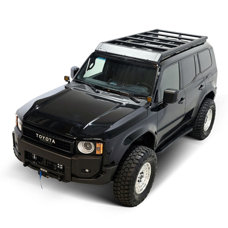 Westin 2026 Toyota Land Cruiser Mesa roof rack mounted on vehicle for extra cargo capacity and roof storage.