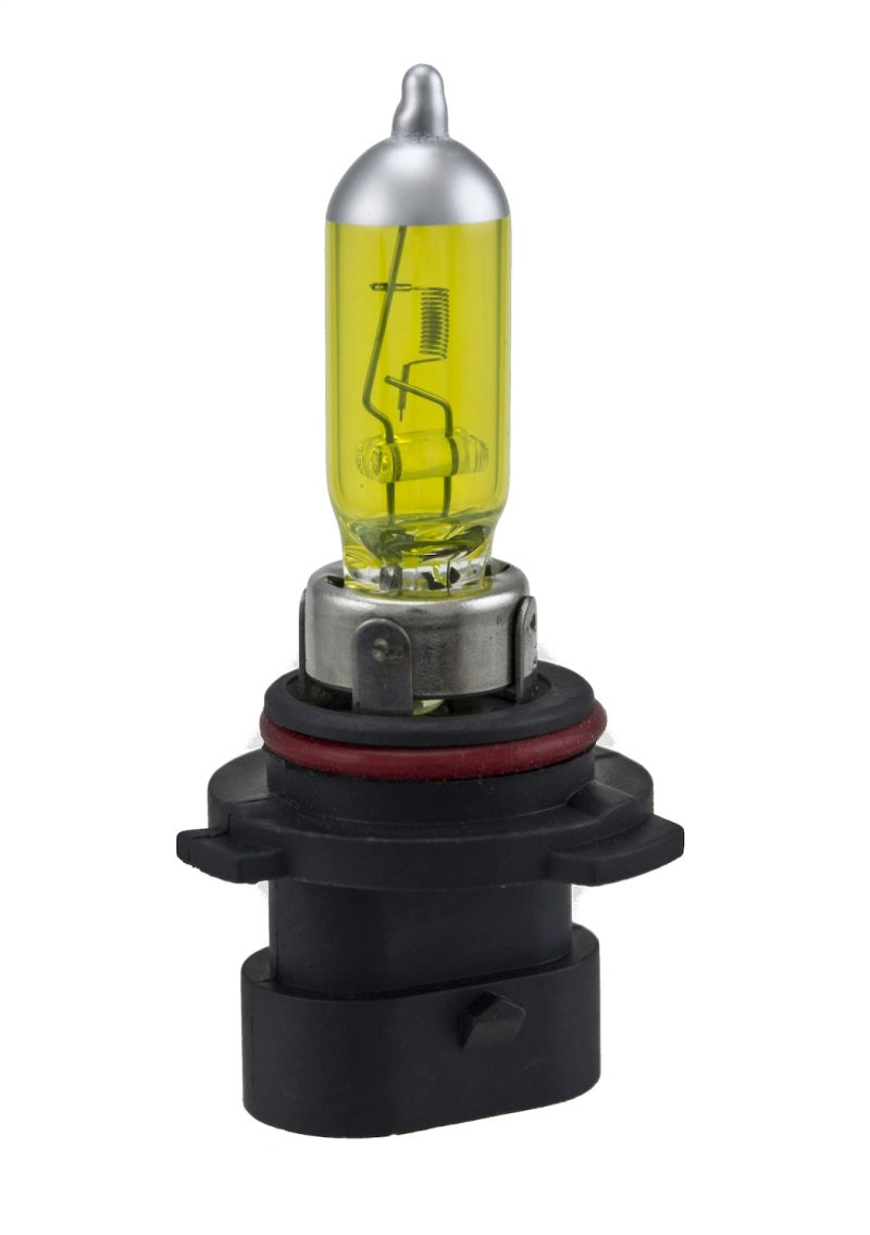 Pair of Hella 9006XS 12V 55W Xen Pure Yellow bulbs for car headlights, with yellow-tinted glass and durable design.