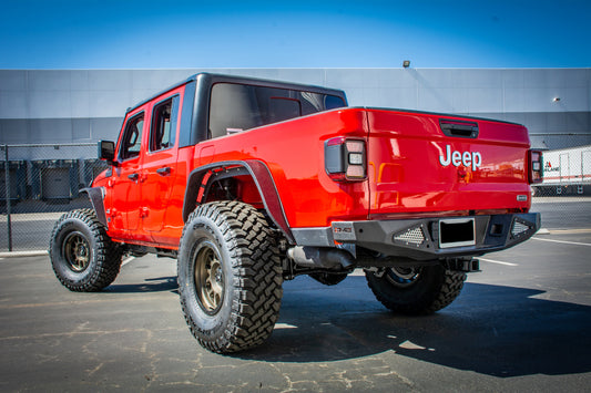 Steel rear bumper for Jeep Gladiator 2018+ by DV8 Offroad, designed for off-road durability and vehicle protection.