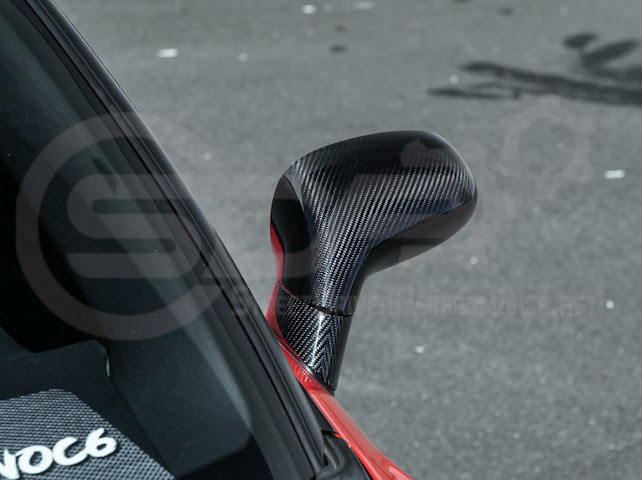 Set of four dry carbon fiber side mirror cap covers for 2005-2013 Chevy Corvette C6, tape-on installation, by Street Driven Performance.