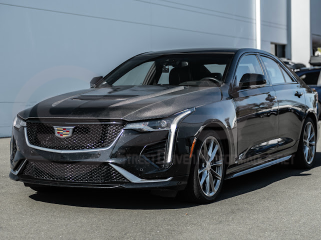 Carbon fiber vented front hood for Cadillac CT4 and CT4-V models, featuring Black Wing style design by Street Driven Performance