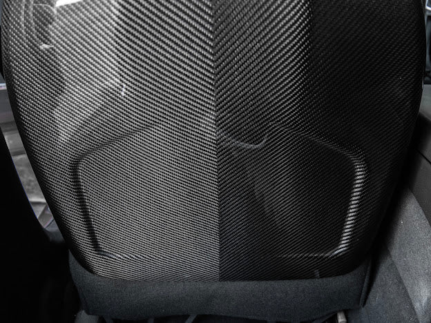Cadillac ATS-V sedan Recaro carbon fiber seat rear panel cover replacement for driver and passenger sides, by Street Driven Performance.