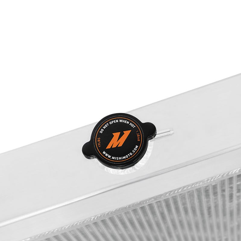 Mishimoto aluminum radiator for 1970-1979 Ford F-Series C/K X-Line trucks, showcasing the sleek, silver cooling core.