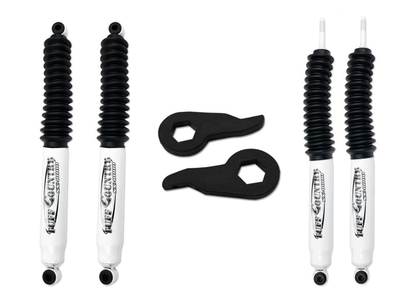 Tuff Country 02-05 Dodge Ram 1500 4WD front leveling kit with SX8000 shocks, showing the assembled kit components on a vehicle.
