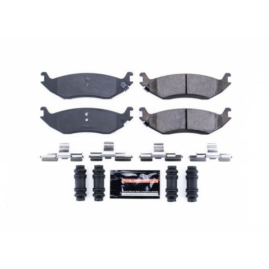 PowerStop Z23 Evolution Sport rear brake pads with hardware installed on a Chrysler Aspen, showing the performance brake pad design.