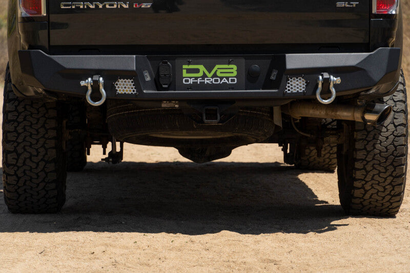 Steel rear bumper for Chevy Colorado and GMC Canyon by DV8 Offroad, part of the MTO Series, designed for offroad durability.