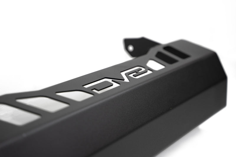 DV8 Offroad Jeep Wrangler JL/JT front bumper sway bar disconnect motor skid plate showing rugged metal construction.