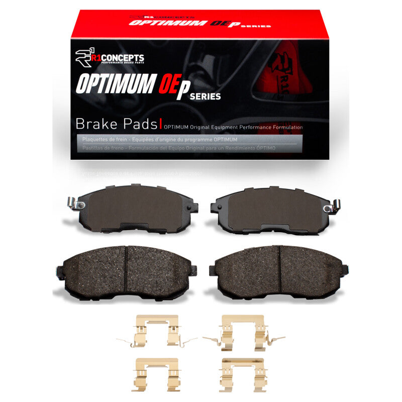 R1 Concepts Infiniti I30 R1 99-13 front OE brake pads and hardware kit, showing new brake pads and hardware components.