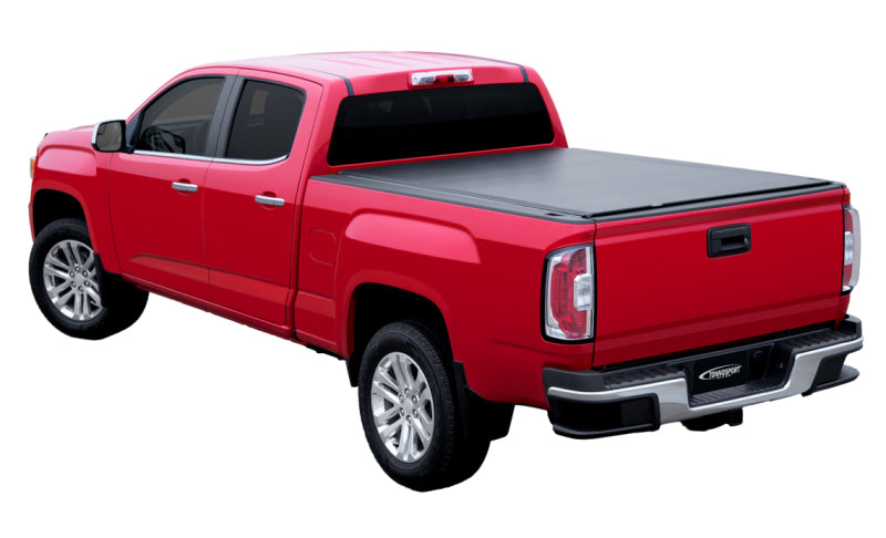 Access Tonnosport roll-up truck bed cover on 2016-2019 Tacoma 5ft bed, exterior view of the accessory on the truck bed.