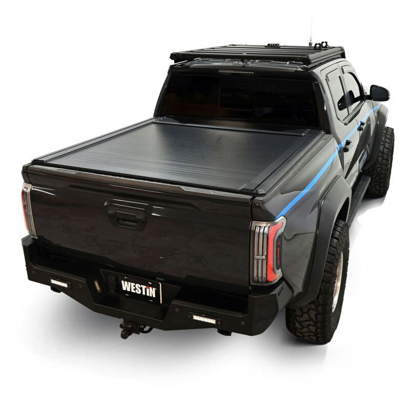 Westin 24-26 Toyota Tacoma black roll-up retractable tonneau cover installed on 5ft truck bed