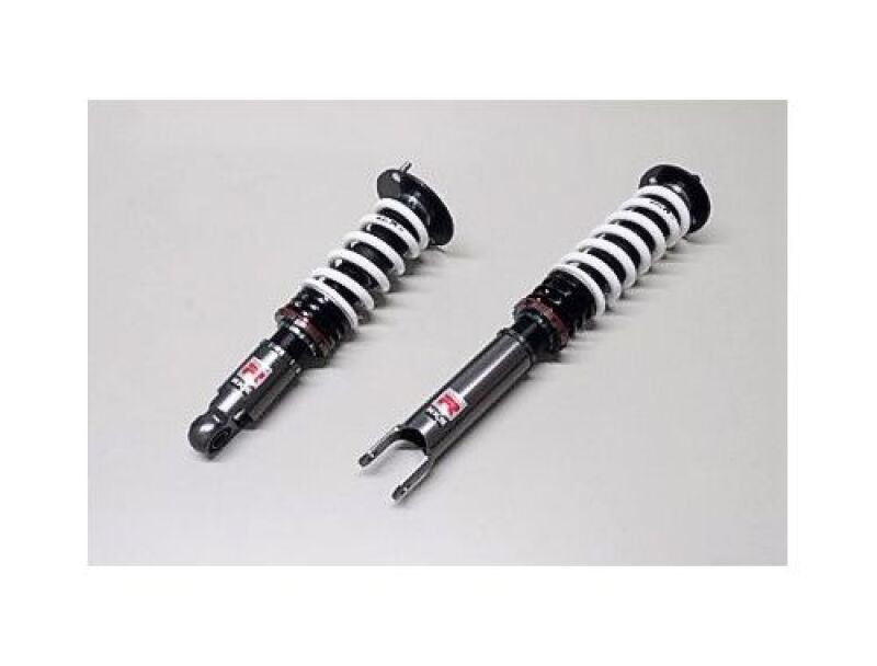 HKS Hipermax R coilover kit installed on a Nissan BNR32 skyline, showcasing adjustable suspension components.