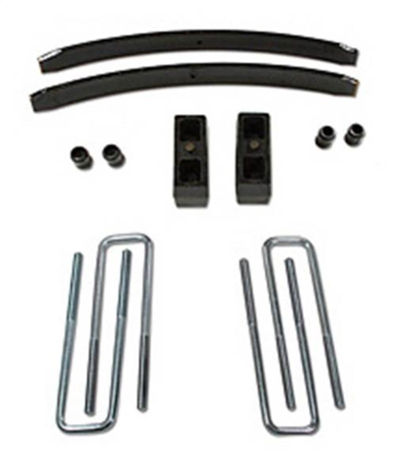 Tuff Country 4in lift kit for 1986-1995 Toyota 4Runner and Pickup trucks, showing assembled suspension components and lift blocks.