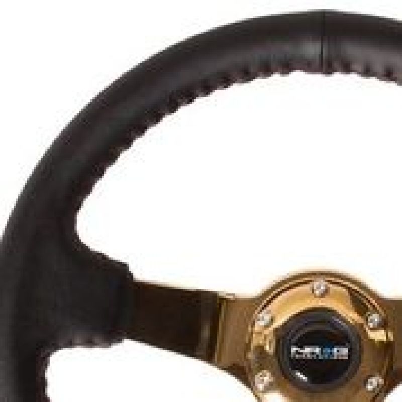 NRG reinforced steering wheel with 3-inch deep black leather grip, red stitching, gold spokes, 350mm diameter.