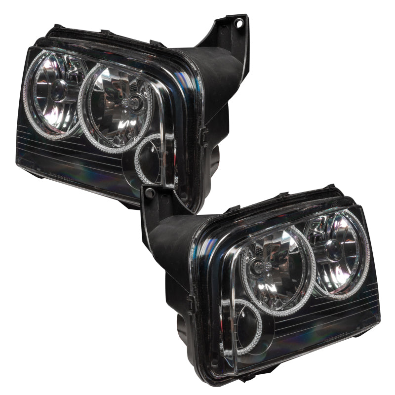 Oracle Dodge Charger SMD HL headlights with triple halo and ColorSHIFT features, showcasing sleek black housing and vibrant lighting elements.