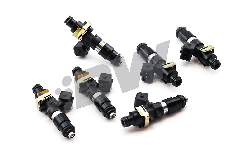 DeatschWerks Bosch EV14 1200cc fuel injectors set for Lexus IS300 2JZ-GE engine, showing six high-performance injectors.