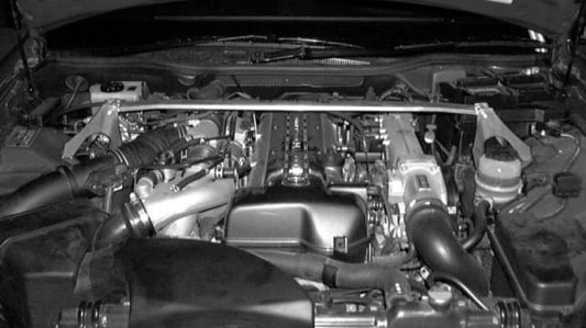 Cusco front strut bar for Lexus GS300 JZS161, enhances chassis rigidity, shown installed on the vehicle's engine bay.