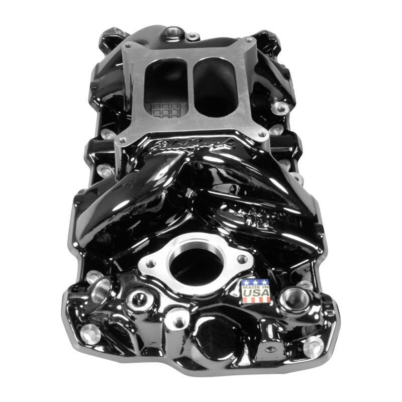 Edelbrock Chevy SB Performer RPM intake manifold in black plasma finish, showing the detailed design and mounting ports.