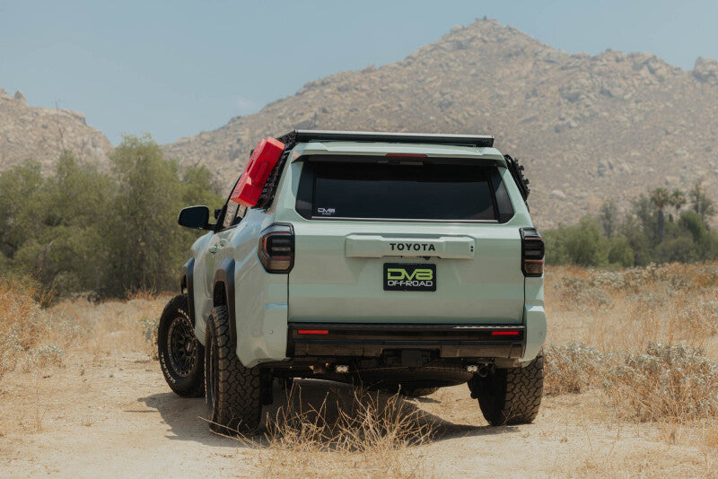 DV8 Offroad Toyota 4Runner exterior window molle panel for DV8 roof rack on driver side, made of durable exterior trim material.
