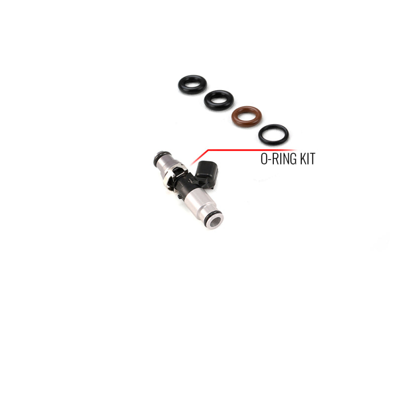 Injector Dynamics fuel injector O-ring and seal service kit with 14mm top and clear bottom adapters, for fuel injector maintenance.