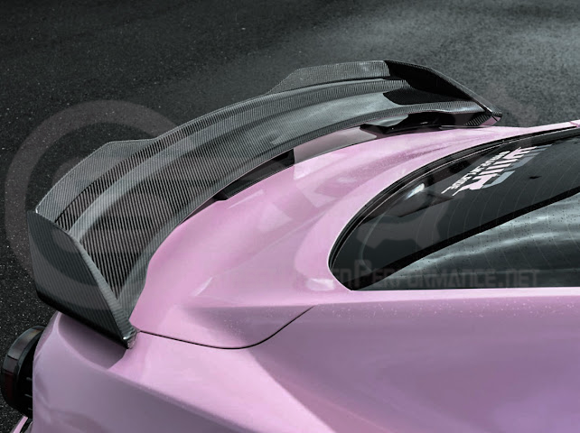 Dark Horse style carbon fiber rear wickerbill spoiler wing on a 2015-2023 Ford Mustang, showcasing sleek aerodynamic design