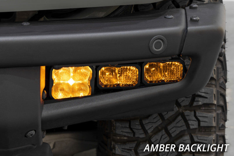 Diode Dynamics 21-Up Ford Bronco Stage Series yellow fog lights installed in fog pockets, showcasing bright LED illumination.