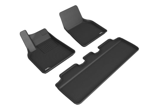 Black 3D MAXpider rubber floor mats for the 2021-2022 Tesla Model Y, designed for the first and second row interiors.