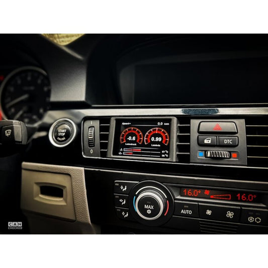 Wagner Tuning BMW 3-Series E90/E91/E92/E93 335i digital gauge display for N54/N55 engines, showing high-tech dashboard readout.