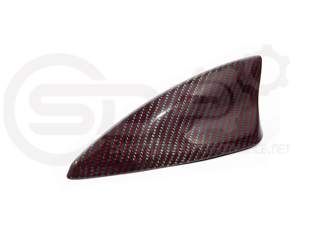 Red carbon fiber shark fin antenna cover for Cadillac ATS, CTS, CT4, and CT5 by Street Driven Performance.
