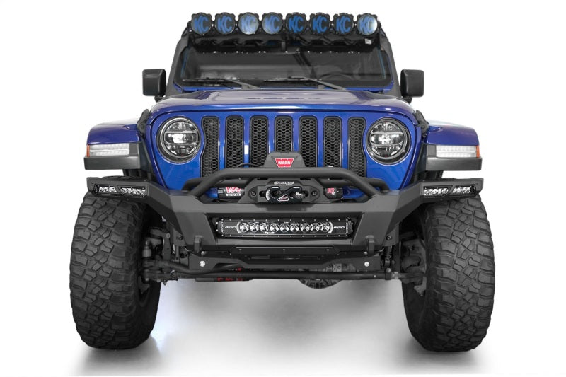 Addictive Desert Designs steel rear bumper for Jeep Wrangler JL and Gladiator JT with integrated winch mount and rugged black finish.