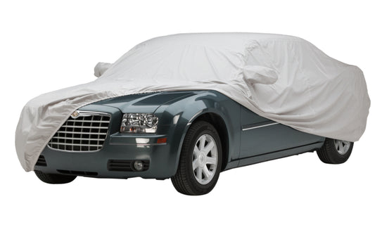 Gray Covercraft Custom WeatherShield HD car cover on a 2020-2025 Ford Mustang coupe, designed for weather protection and fit.