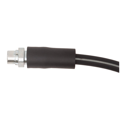 DFC BMW Z8 front brake hose from brake line kit, flexible rubber brake line with metal fittings, installed on vehicle wheel.